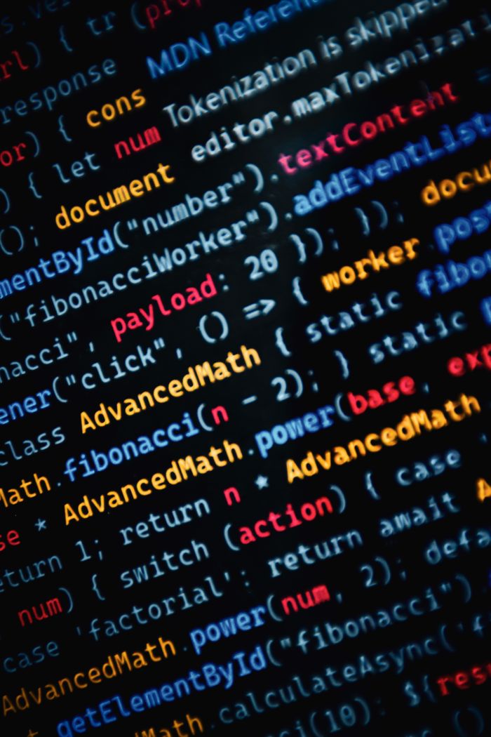 Services Close-up of vibrant JavaScript code displayed on a monitor showcasing web development.